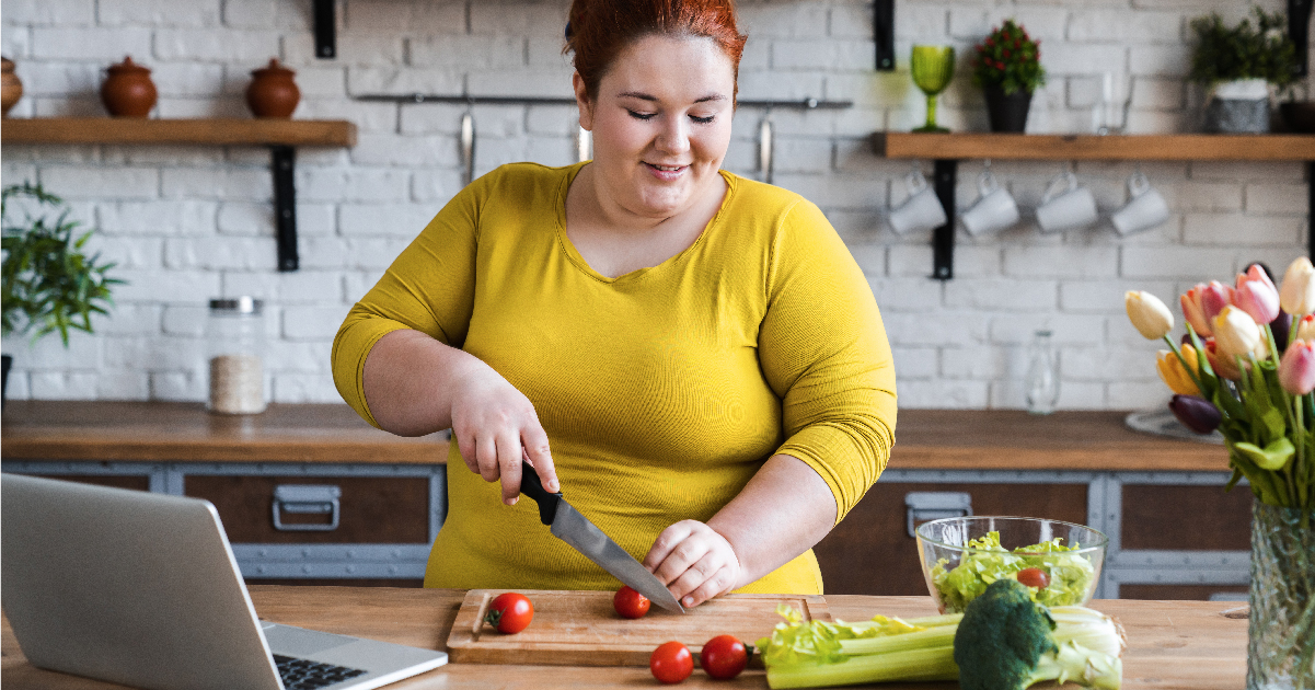 Woman with Hypothyroidism Preparing Food for Intermittent Fasting